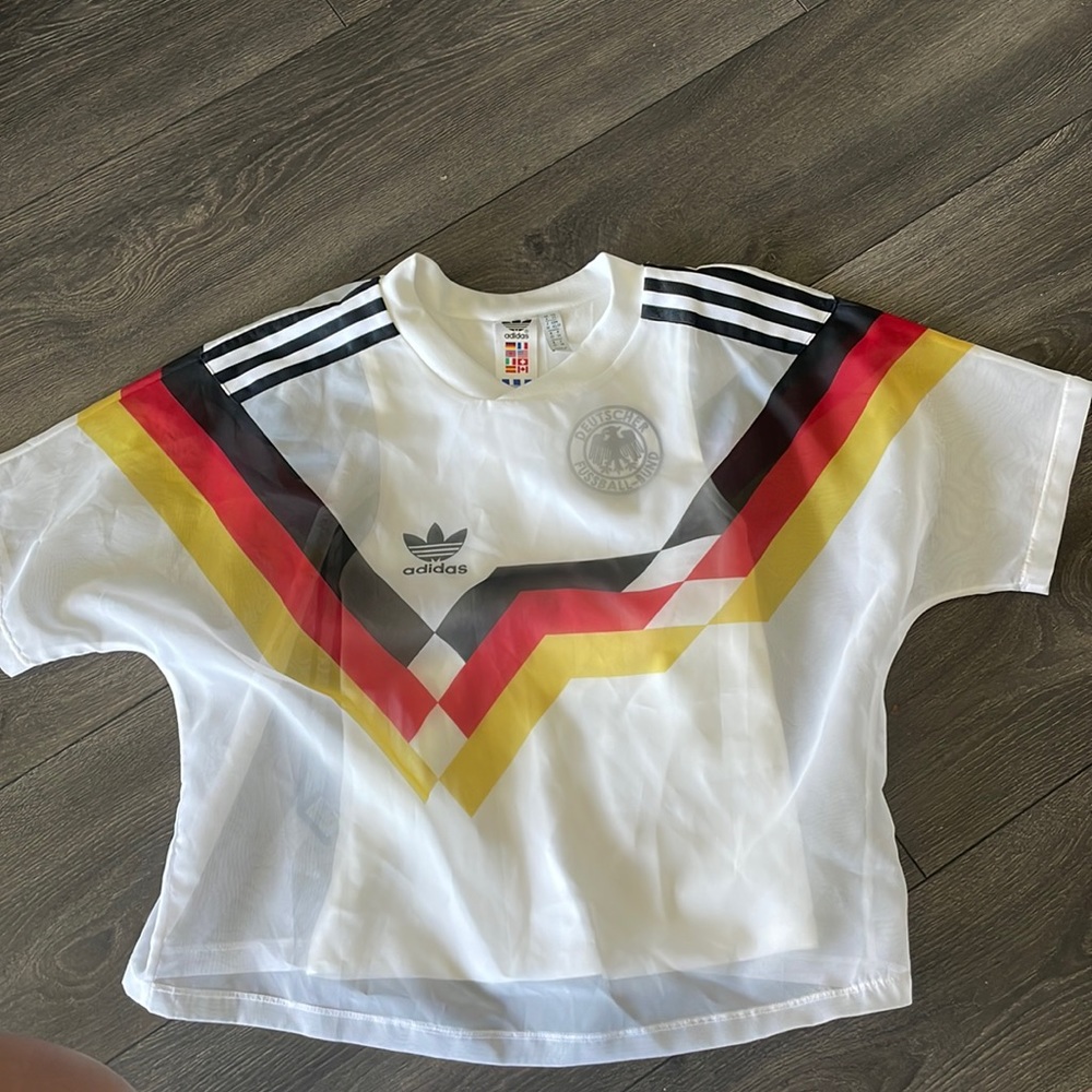 Super cute Womens Adidas soccer shirt. So cute and fashionable.